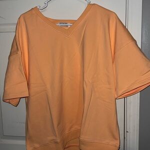 Shop FANCY Orange V-Neck Short Sleeve Terry Pullover